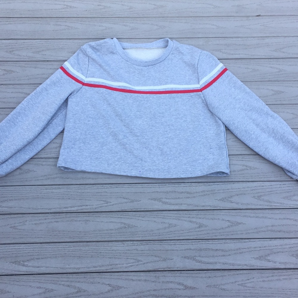 Grey, red, and white striped crop top.